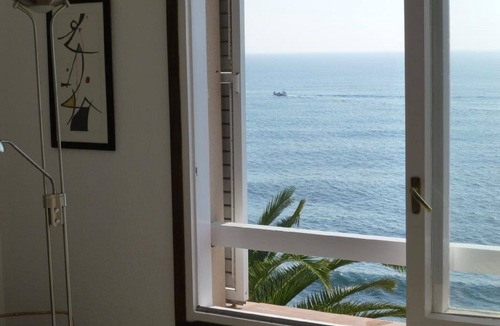 Sant Andreu de Llavaneres Apartment | Palm Garden, large Pool, nice local Beach, beautiful View @ Barcelona's door