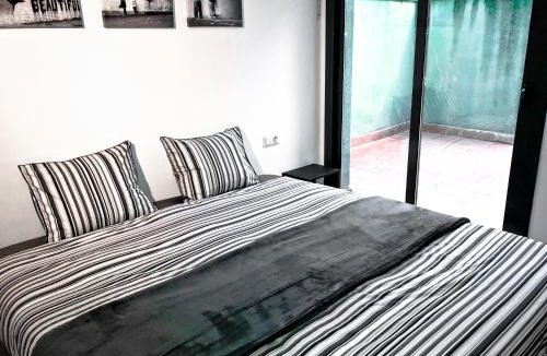 Vic - Remei Apartment | Urban Manesa city center apartment with private patio