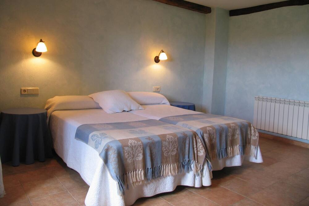 Photo of Bedroom in Viver i Serrateix