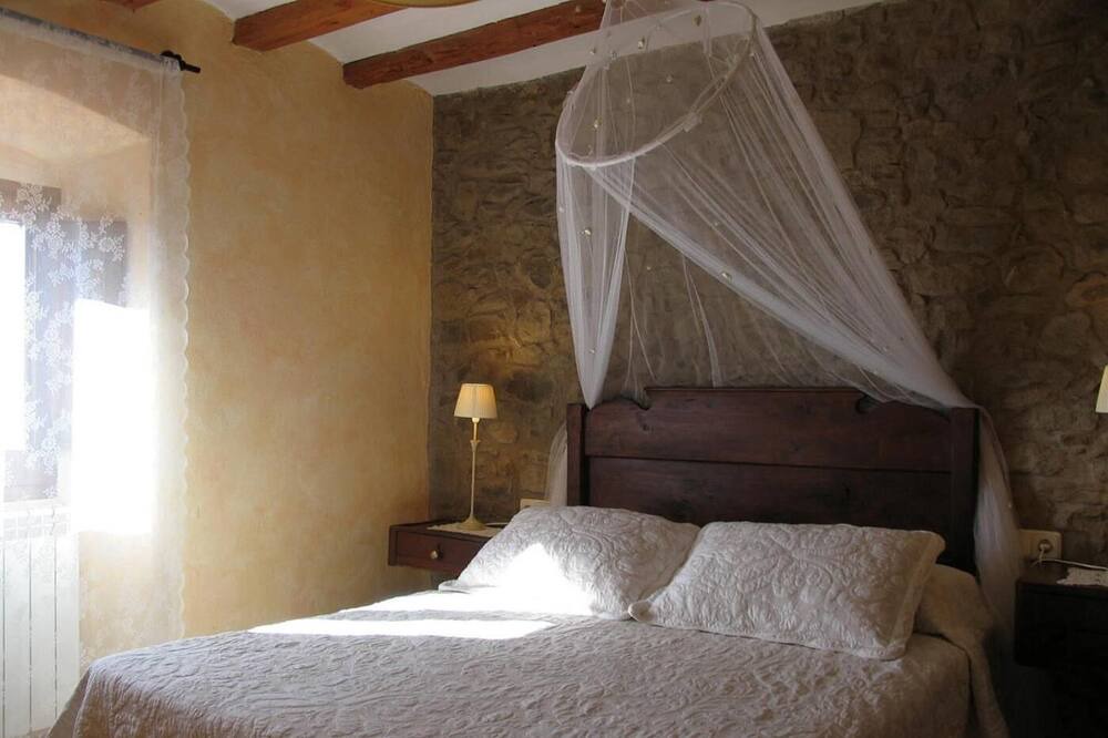 Photo of Bedroom in Viver i Serrateix