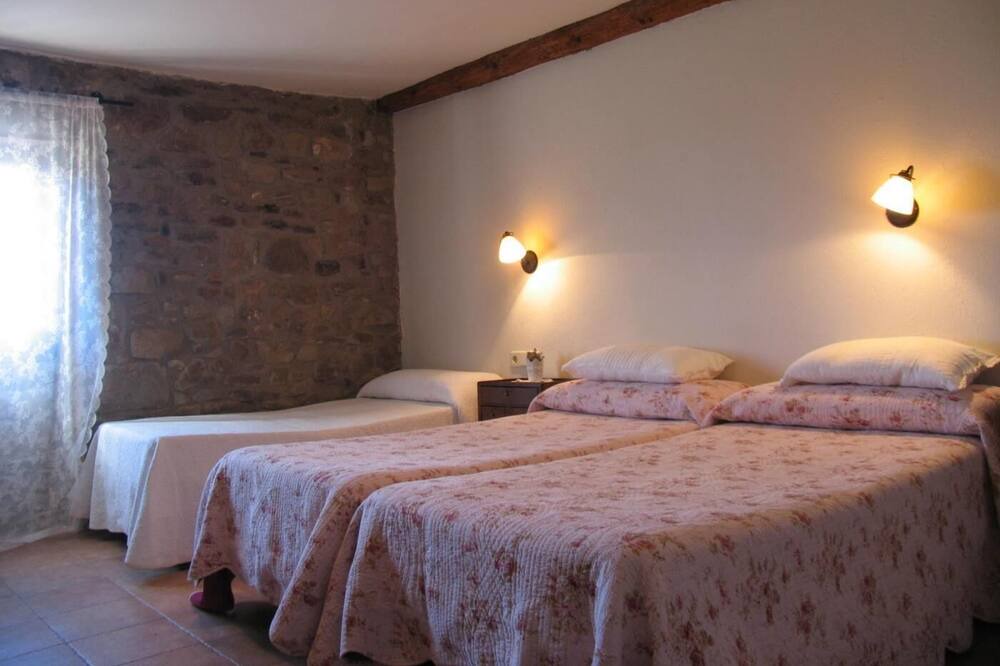 Photo of Bedroom in Viver i Serrateix